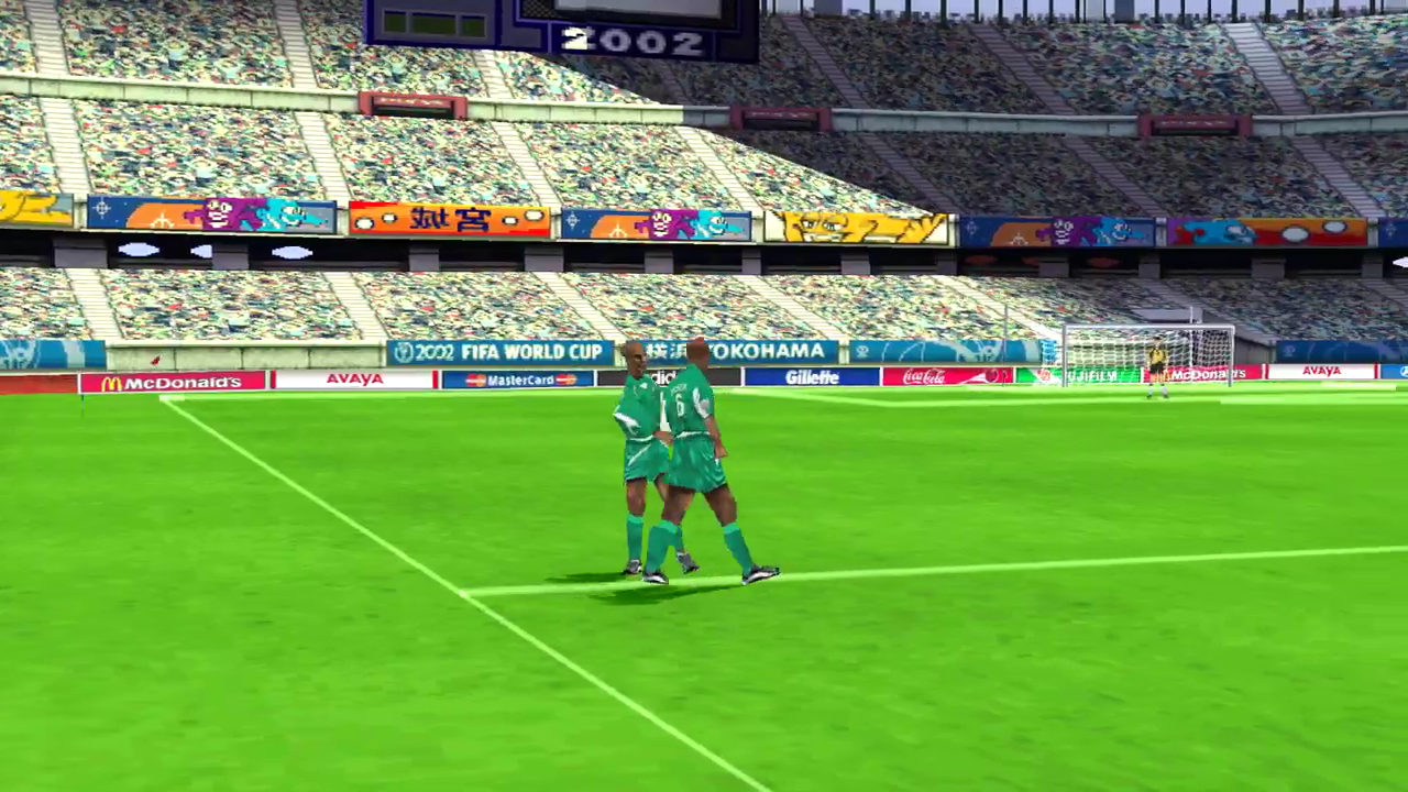 [2002 FIFA World Cup](https://en.wikipedia.org/wiki/2002_FIFA_World_Cup_(video_game)) screenshot: realistic, three-quarter, no outlines, soft gradient (environment, character)