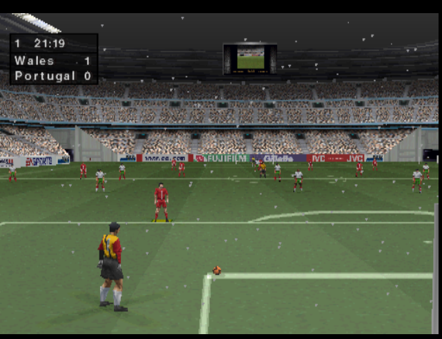 [FIFA: Road to World Cup 98](https://en.wikipedia.org/wiki/FIFA:_Road_to_World_Cup_98) screenshot: low-poly, three-quarter, no outlines (environment, character)