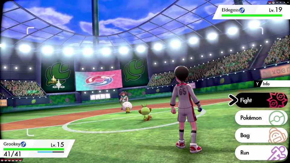 Pokémon Shield screenshot: stylized 3d, cel-shaded, third-person, black outlines, two-tone cel (combat)