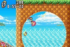 Sonic Advance screenshot: pixel art, side-scrolling, colored outlines, dithered shading (environment, character, combat)