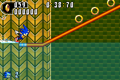 Sonic Advance 2 screenshot: pixel art, side-scrolling, colored outlines, dithered shading (environment, character, combat)