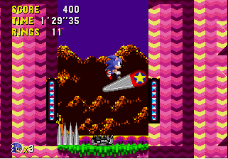 Sonic CD screenshot: pixel art, side-scrolling, colored outlines, dithered shading (environment, character, combat)