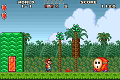 Super Mario Advance screenshot: pixel art, side-scrolling, colored outlines (environment, character)