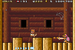 Super Mario Advance 4: Super Mario Bros. 3 screenshot: pixel art, side-scrolling, black outlines, dithered shading (combat)