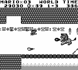 Super Mario Land screenshot: pixel art, side-scrolling, black outlines, flat / unlit (combat)