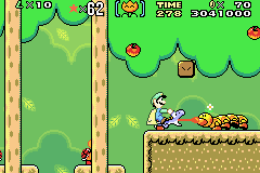 Super Mario World: Super Mario Advance 2 screenshot: pixel art, side-scrolling, three-quarter, black outlines, flat / unlit (character, combat)