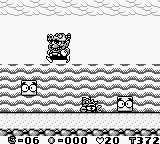 Wario Land: Super Mario Land 3 screenshot: pixel art, side-scrolling, black outlines, dithered shading (environment, character)